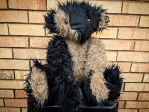 Walter The Short Curly Haired Black And Beige Faux Fur Teddy Bear With Copper Eyes